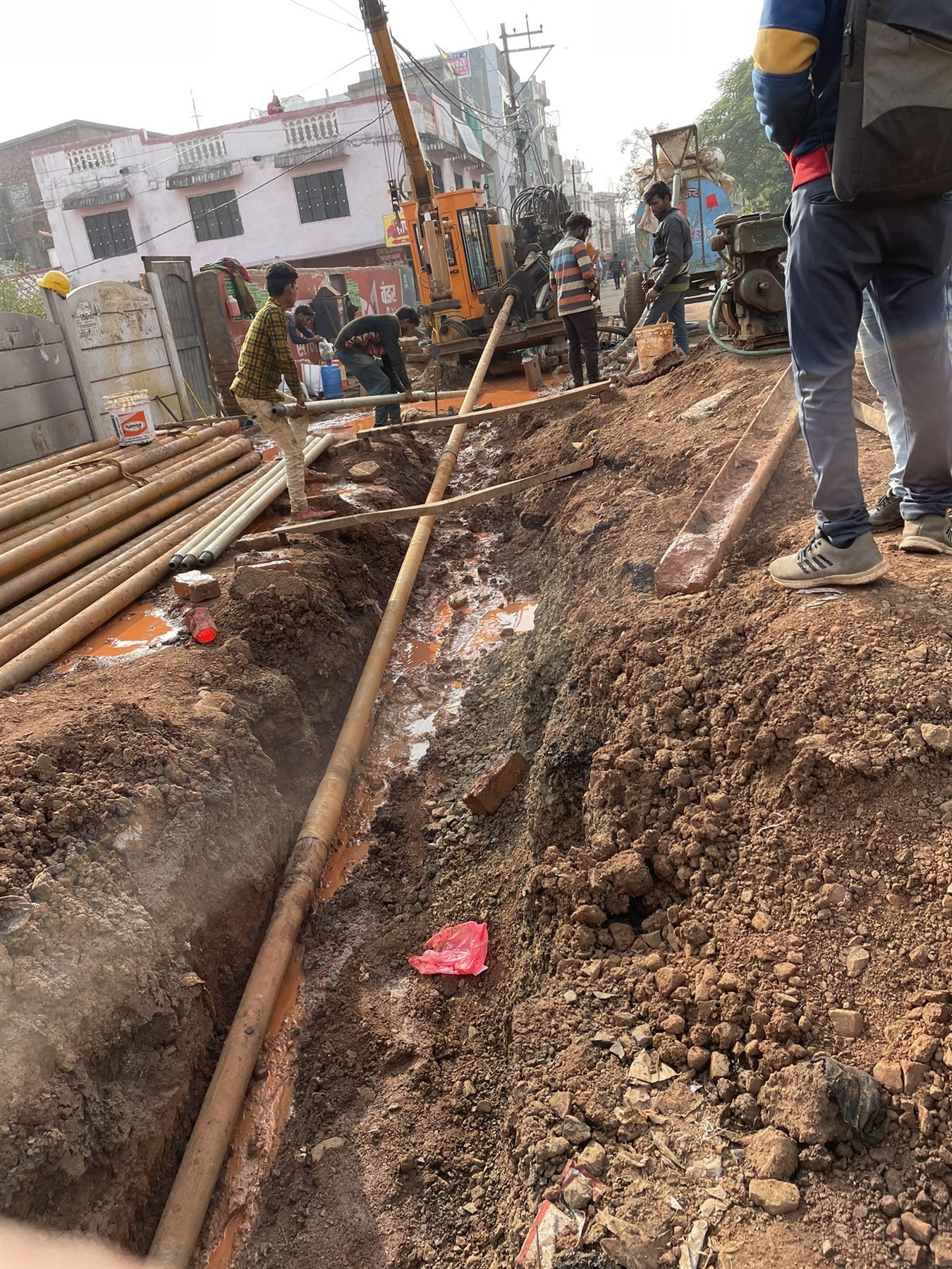 Steel pipeline being installed within a prepared trench